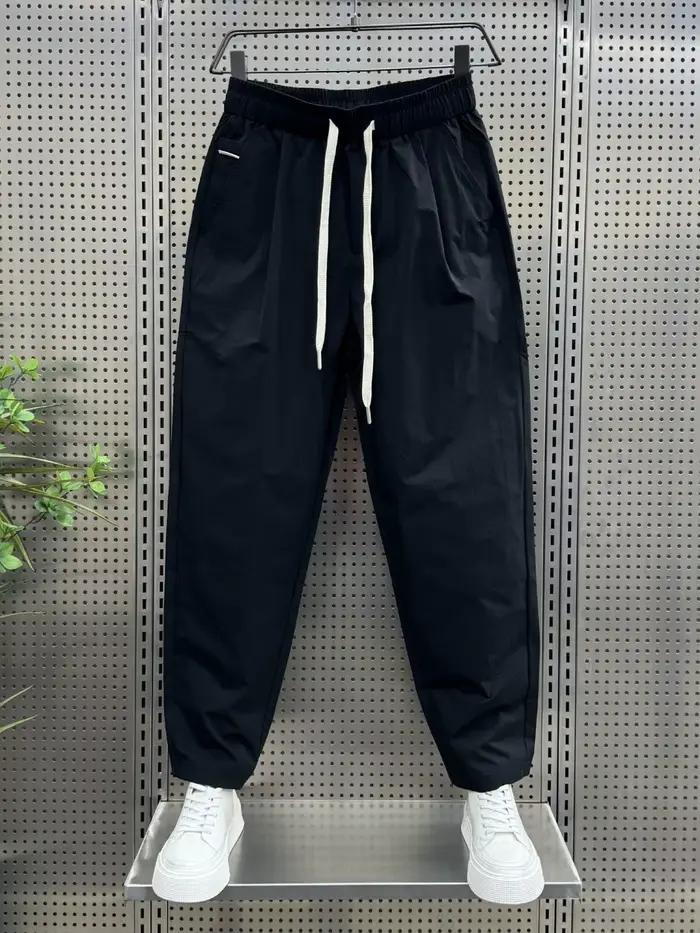 2025 printemps et automne nouveau pantalon décontracté de couleur unie ample droit polyvalent nouvea