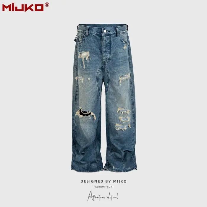 Jeans bleu à jambe large en denim délavé MIJKO TJ164