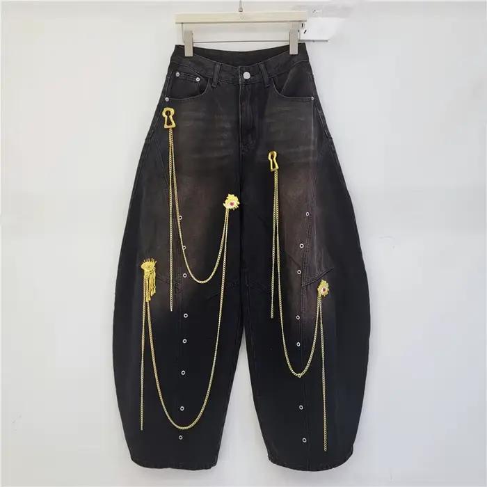 Pantalon large unisexe style urbain avec chaîne dorée décorative, nouvelle collection Printemps 2026