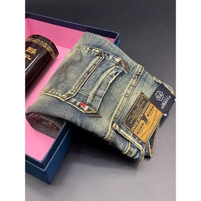 Mode de rue hommes jean rétro bleu élastique mince déchiré