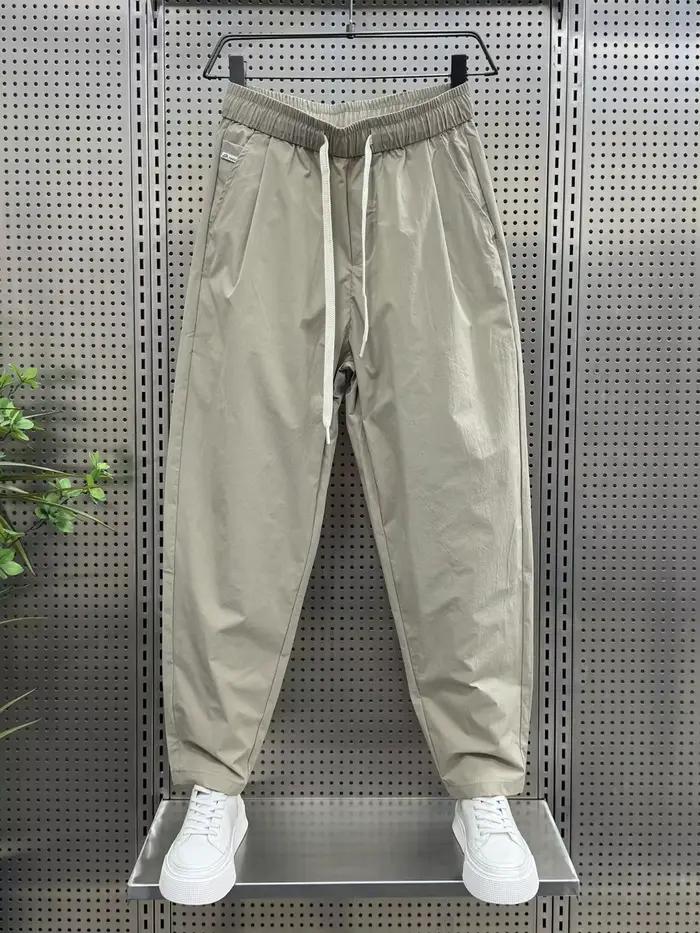 2025 printemps et automne nouveau pantalon décontracté de couleur unie ample droit polyvalent