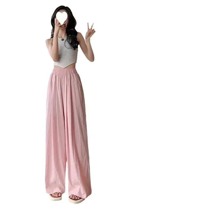 Pantalon décontracté à taille haute en coton et lin drapé pour femmes
