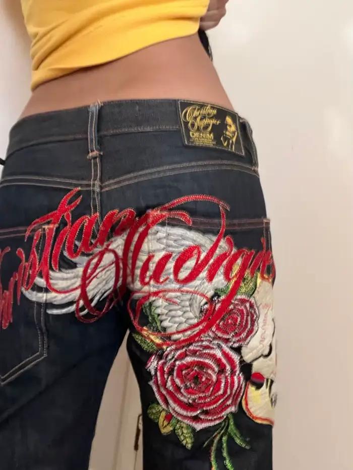 Jeans à broderies d'ailes d'ange pour femme