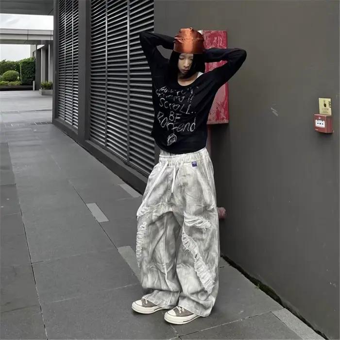 Jeans délavés vintage ample pour hommes et femmes avec trous décoratifs style hip-hop printemps automne danse occasionnels