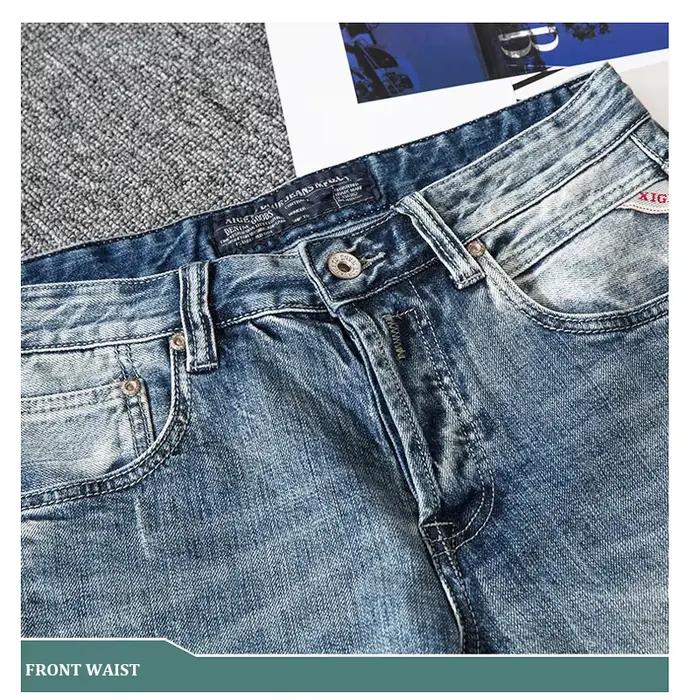 Style italien mode hommes jean rétro bleu clair coupe ajustée déchiré