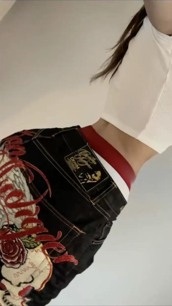 Jeans à broderies d'ailes d'ange pour femme