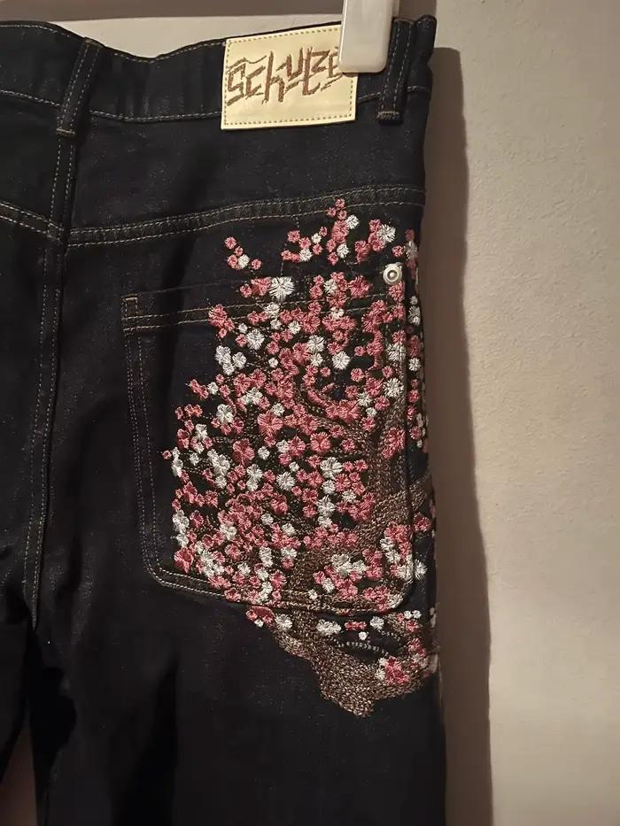 Jean noir Slim à jambe droite unisexe