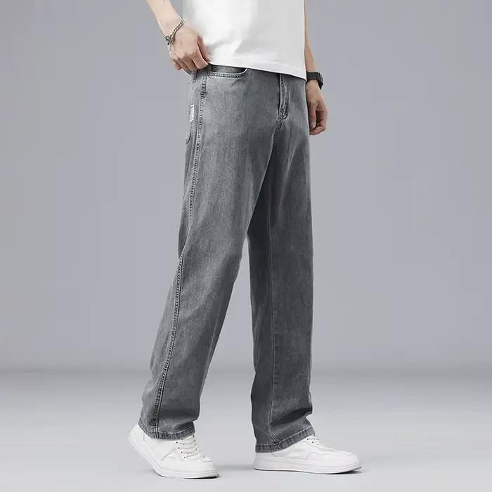 Été Ultra-mince Lyocell hommes jean drapé tissu doux ample droit décontracté Denim pantalon élastique glace soie mâle