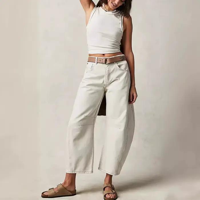 Jean en denim délavé coupe ample et jambe large taille basse pour femme – Tendance 2026 – Confort et extensibilité