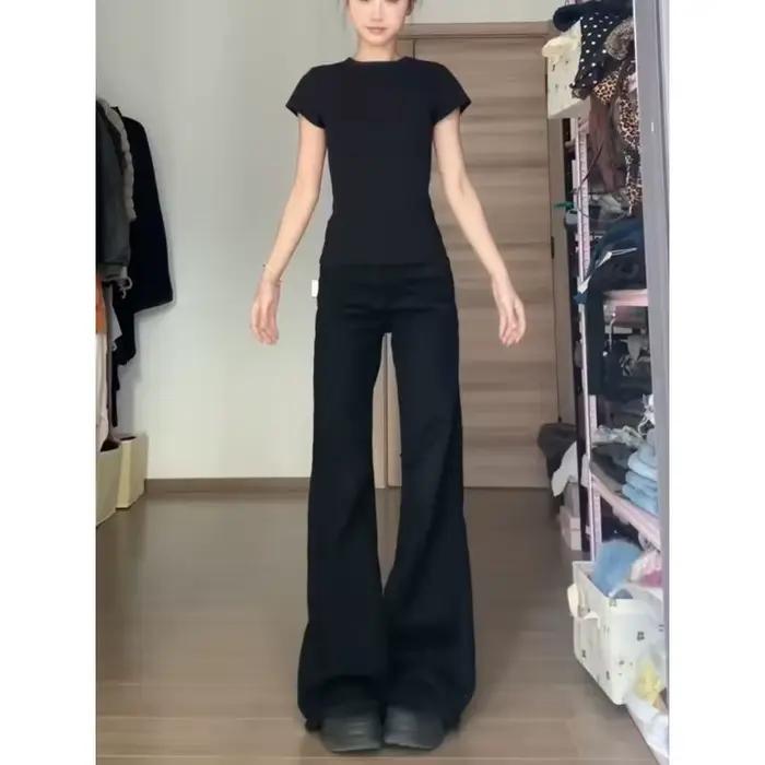 Jean évasé noir taille haute pour femme