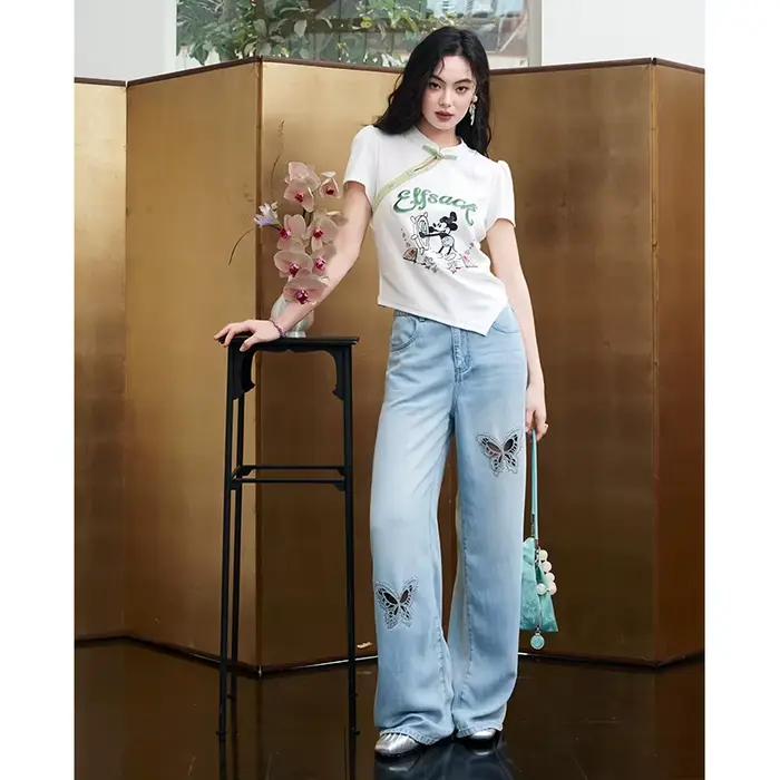 Jean à jambes larges ample à taille haute avec découpe papillon et strass pour femmes style décontracté occassions estivales et printanières