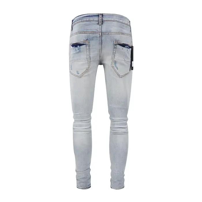 Nouveau jean Y2K bleu clair délavé avec patch en cuir noir vieilli