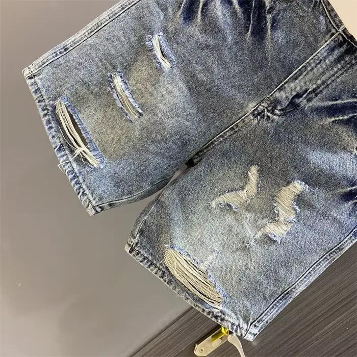 Short en jean déchiré pour femme