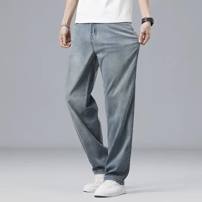 Été Ultra-mince Lyocell hommes jean drapé tissu doux ample droit décontracté Denim pantalon élastique glace soie mâle