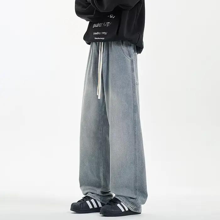 Nouveau Jean Homme Uni avec Cordon de Serrage Pantalon en Denim Style Streetwear Coréen Pantalon Cowboy Occasionnel Quotidien