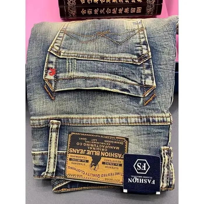 Mode de rue hommes jean rétro bleu élastique mince déchiré