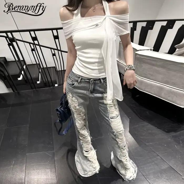 Benuynffy taille basse rétro déchiré jean évasé femme Streetwear mode coréenne mince lavé cloche bas Denim pantalon 2025 nouveau