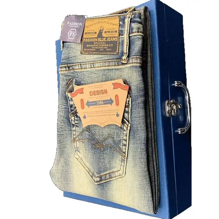 Mode de rue hommes jean rétro bleu élastique mince déchiré