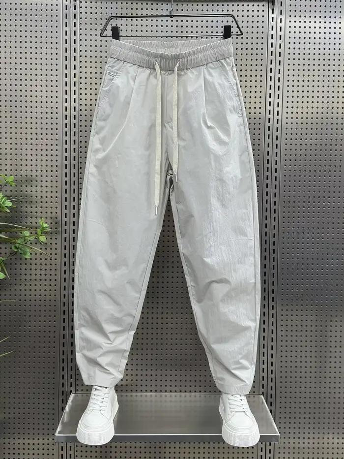 2025 printemps et automne nouveau pantalon décontracté de couleur unie ample droit polyvalent