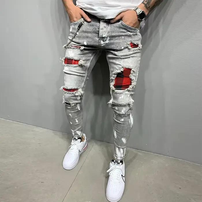 Nouveaux hommes maigre déchiré jean mode grille trou Endothecium patchs coupe ajustée Stretch décontracté Denim crayon