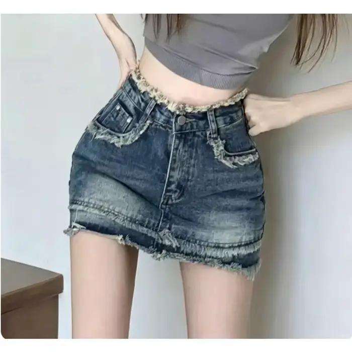 Jupe courte en jean vintage taille haute à ourlet effiloché pour femme