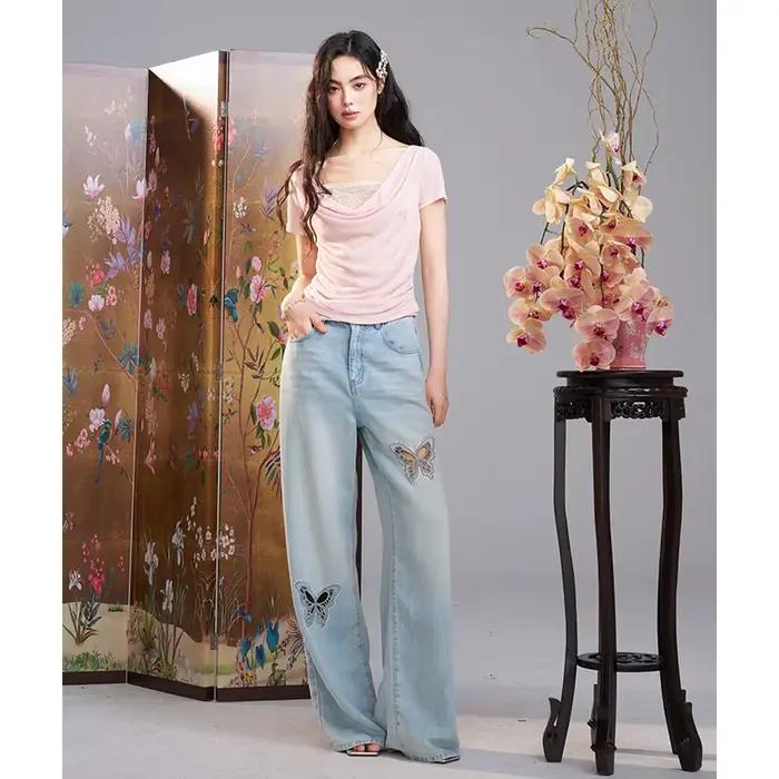 Jean à jambes larges ample à taille haute avec découpe papillon et strass pour femmes style décontracté occassions estivales et printanières