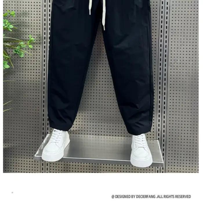 2025 printemps et automne nouveau pantalon décontracté de couleur unie ample droit polyvalent