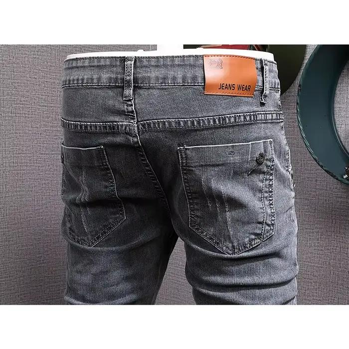 Créateur de mode hommes jean rétro gris Stretch mince déchiré