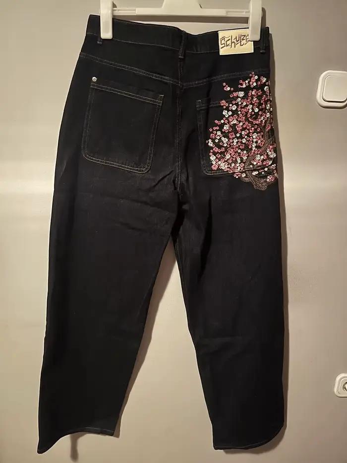 Jean noir Slim à jambe droite unisexe