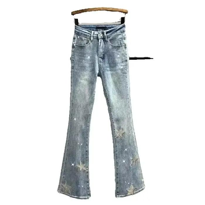 Nouveau jean en denim micro-déchiré brodé pentagramme pour femme, coupe slim, taille haute élastique, collection été 2026 pour occasions variées