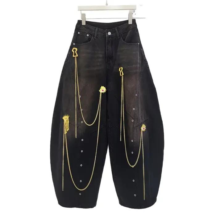 Pantalon large unisexe style urbain avec chaîne dorée décorative