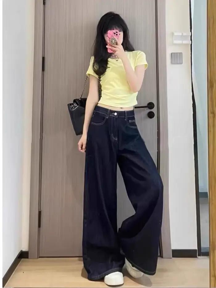 Jean large bleu marine chic et vintage pour femme, taille haute, coupe droite, minimaliste, drapé, l