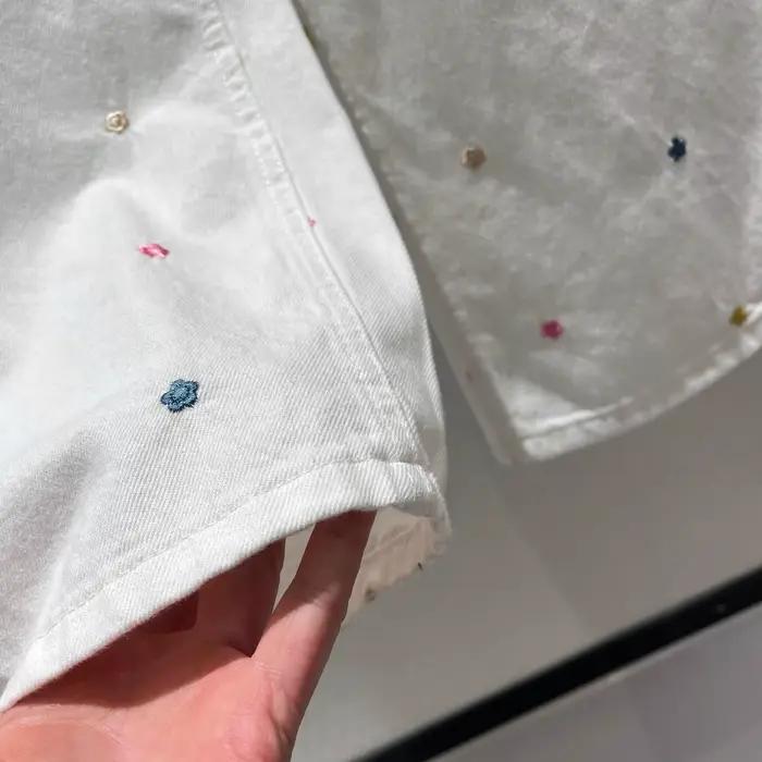 Pantalon en denim blanc pour femmes imprimé floral brodé jambes larges taille haute printemps automne casual chic