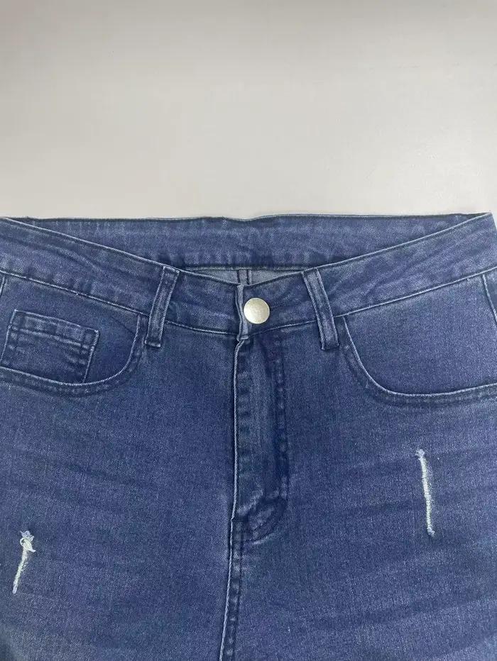 Jeans en denim stretch slim pour homme avec détails déchirés et surpiqûres contrastées