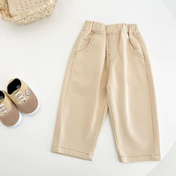 Jeans unis sans entrejambe pour garçons et filles, pantalons polyvalents en pur coton, et pantalons longs tendance pour le printemps et l'automne