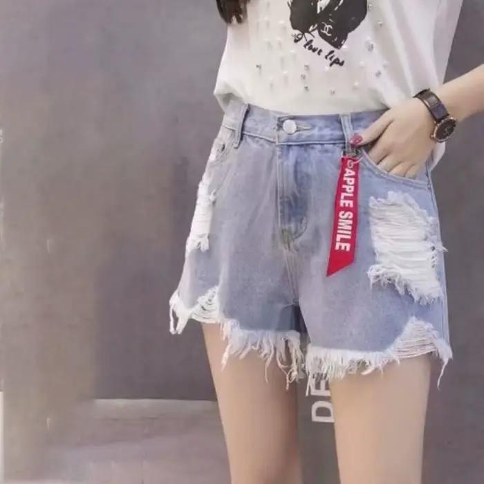 Short en Jean déchiré à la mode