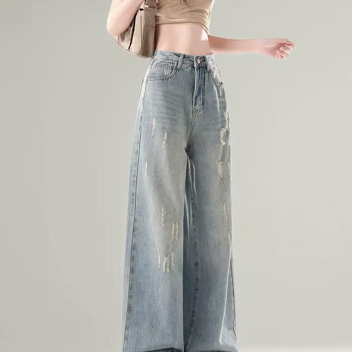 Jean large délavé et vieilli pour femme