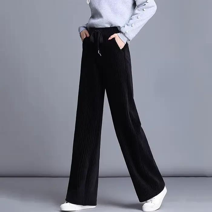 Pantalon large en velours côtelé fluide pour femme