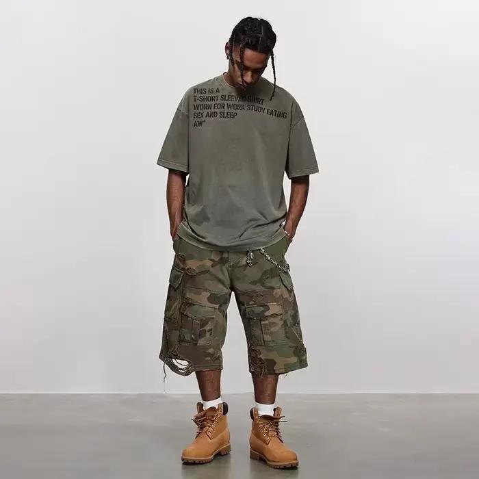 Camouflage déchiré lavé vieux hommes Vintage ample pantalon à jambes larges américain rétro Hip-Hop poche gothique haute rue jean décontracté