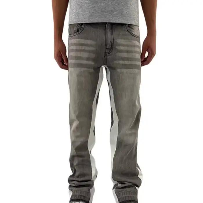Jeans gris micro-évasés lavés avec surpiqûres