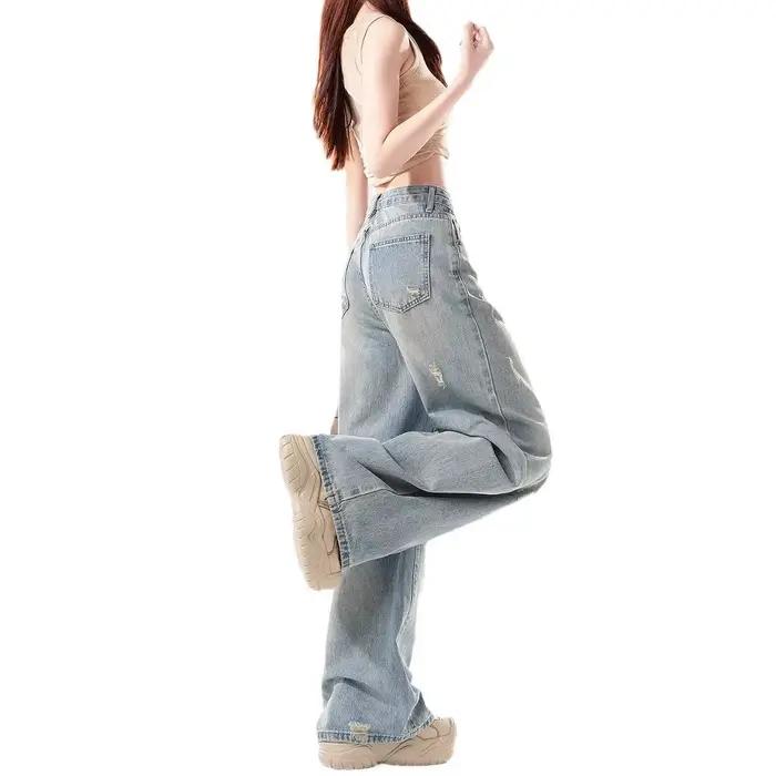 Jean large délavé et vieilli pour femme